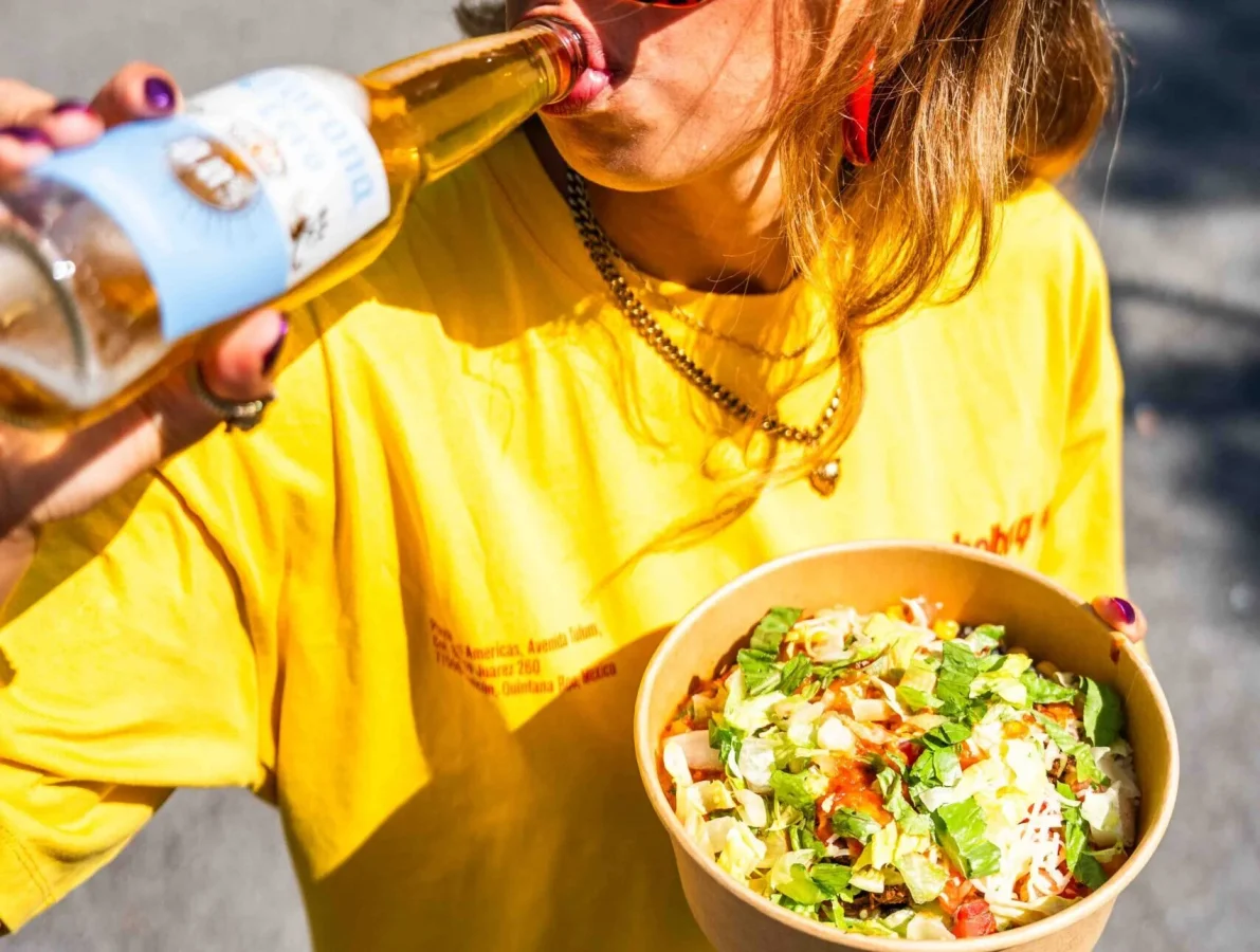 Guests enjoying fresh Mexican food at a Salsa Shop by the waterfront